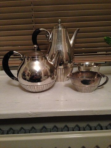 4 piece Georg Jensen Sterling Silver/830 silver Coffee and Tea Service in the Cosmos Pattern No 45. Very old marks.