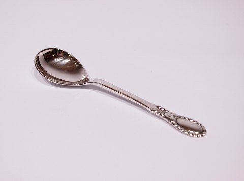 Marmelade spoon by Evald Nielsen nr 13  in 830 silver.
5000m2 showroom.
