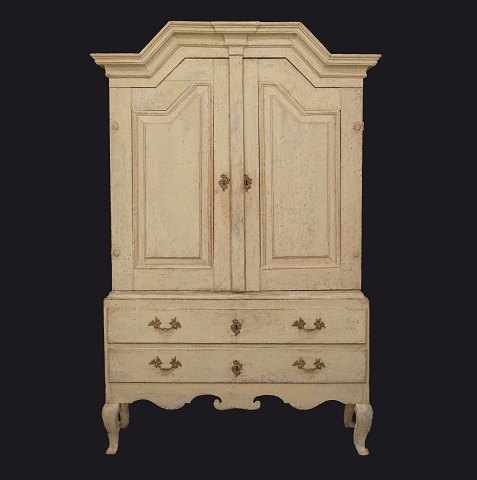 A mid 18th century Baroque cabinet. Sweden circa 
1750. H: 193cm. B: 127cm. D: 43cm