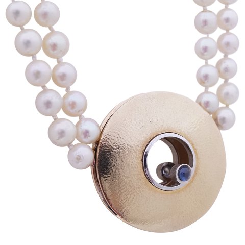 Ole Lynggaard; Luna smykkelås (stor) af 14 kt. guld og hvidguld med safir og brillant