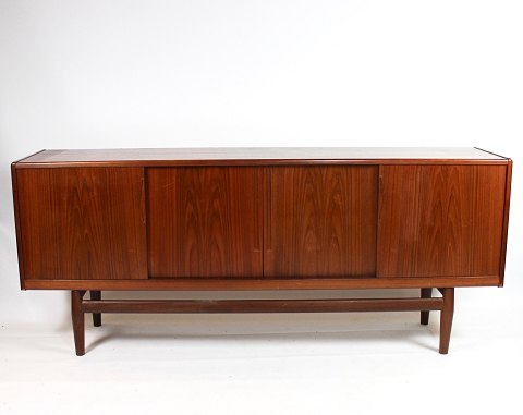 Skænk - Dansk design - Teak - Fire Skydelåger Med Hylder - 1960
Flot stand
