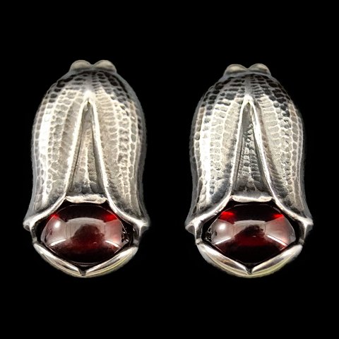 Georg Jensen; Heritage jewellery, 2007, earclips made of sterling silver set with a garnet