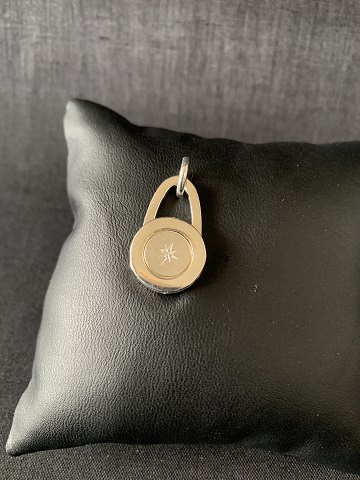 Very elegant pendant in 925 sterling silver, with inlaid Brilliant. Ideal for a necklace.