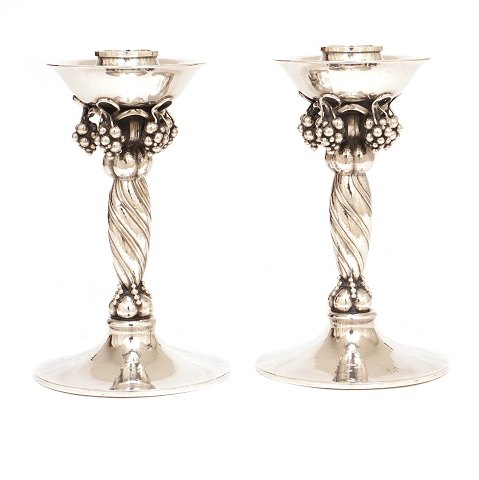 Pair of Georg Jensen sterlingsilver Grape candle 
sticks 263 after 1945. H: 15cm