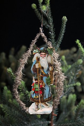 Antique Christmas tree decoration from around 1900 in the form of Santa