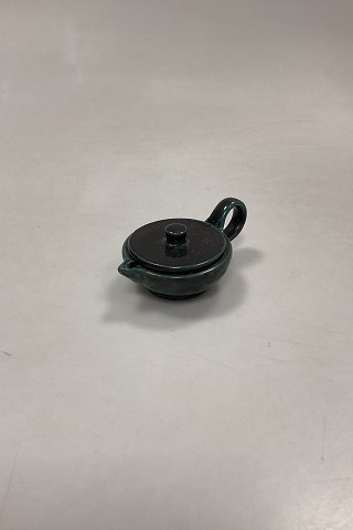 Small oil lamp in green/black ceramic