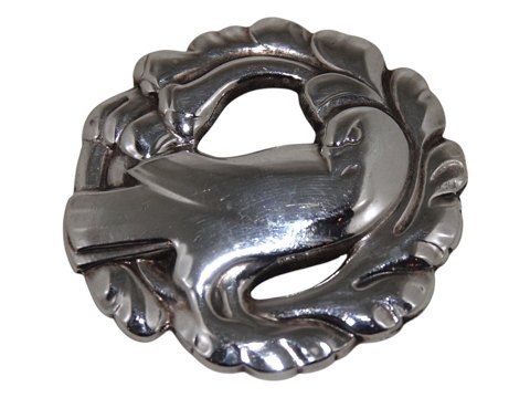 Georg Jensen
Rund broche med due