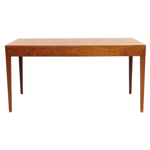Rosewood veneered writing table by Severin Hansen, 
Denmark. Manufactured by Haslev Møbelsnedkeri. 
Nice condition. H: 72cm. Plate: 75x143cm