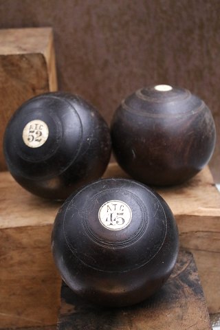 Decorative, antique bowling ball in wood with number inlaid in horn...