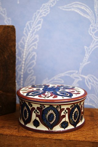 Royal Copenhagen bonbonniere designed by Berte Jessen in blue and red-violet pattern...