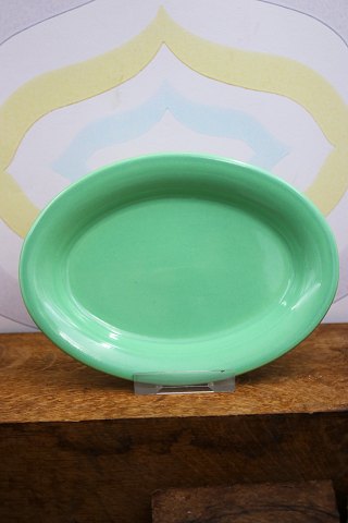 Ursula dish in faience from Royal Copenhagen designed by Ursula Munch-Petersen in light green glaze...