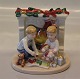 Royal Copenhagen figurine 411 RC Christmas morning - children with their gifts ca 8.5 x 8.5 cm