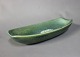 Oblong dark green ceramic dish by Thorup.5000m2 showroom.