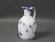 Royal Copenhagen blue fluted half lace oil jug #1179.5000m2 showroom.
