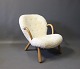 "The Clam Chair" originally designed by Phillip Arctander in 1944 and manufactured by Paustian.5000m2 showroom.
