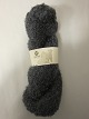 Mohair BoucléMohair Bouclé er et naturprodukt fra sydafrikanske angorageder.Den viste farve er: Stål grå, Farvenr. 1035Prisen er pr. nøgle med 100 gram Mohair Bouclé
