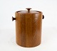 Ice bucket in teak designed by Jens Harald Quisgaard. 
5000m2 showroom.
