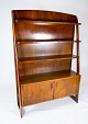 Bookcase with cabinet beneath in walnut of danish design from the 1950s. 5000m2 showroom.