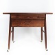 Side table in rosewood on wheels of danish design from the 1960s. 5000m2 showroom.