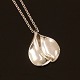Hans Hansen Sterlingsilver pendant with a sterlingsiver necklace. L: 68cm. Pendant: 5,5x4,6cm