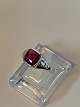 Ring with red stone in 14 carat white gold
Size 69