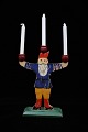 Old Swedish Santa Claus candlestick in carved wood / painted with fine patina from the 50s.H:21cm.