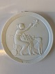 Royal Copenhagen Thorvaldsen Bisquit plate, Shepherdess with Cupid in a nest. 
13.5 cm