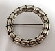 Georg Jensen. Silver brooch (925). Design Sigvard Bernadotte. Model 301. Diameter 35 mm. Produced 1933-1945
