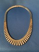 Necklace in 14 carat gold, bricks in 7 rows, with process, stamped 585 JTH. Length 41 cm.