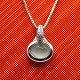 Ole Lynggaard; Emely pendant in 18k white gold set with moonstone and diamonds
