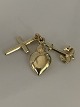 Pendant in 14 carat gold, with the 3 symbols of faith, hope and love. Stamped 
585.