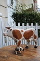 Decorative, large 19th century cow in carved wood with old paint..
H: 36cm. L: 60cm.