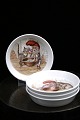 Royal Copenhagen glass / bottle tray in porcelain with various Christmas motifs 
of a gnome and a cat...