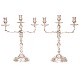 Pair of sterlingsilver Rococostyle candelabra by A. Michelsen, Copenhagen, 1951. 
H: 35,5cm. W: 2.053gr