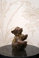 Nice little Arne Bang ceramic bear with fine glaze in mixed brown / ochre color.