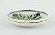 Kähler, Denmark.Ceramic bowl with floral motif. Glaze in green and black tones.