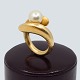 Antik Damgaard-Lauritsen presents: Ole Lynggaard; Ring of 14k gold set with a pearl