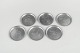 Just Andersen, set of six coasters in pewter with Copenhagen motifs.
