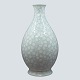 Antik Damgaard-Lauritsen presents: Bing & Grøndahl; Art Nouveau porcelain vase with floral pattern in white and ...