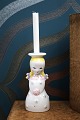Nymolle Christmas angels in faience with yellow hair and space for a small fir branch or candle at the top.