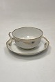 Danam Antik presents: Royal Copenhagen No. 118/2007 Tea Cup with Saucer Golden Peacock Ornament