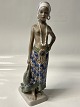 Antik Huset presents: Dahl Jensen oriental figurine, girl from East Sierra Leone.Dec. Nr. 1117.