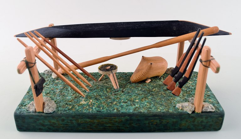 Greenlandica kayak in wood. Hand-carved utensils.