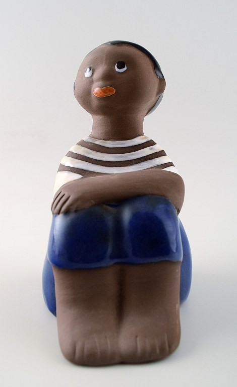 Mari Simulson, Upsala-Ekeby.Signed. Figure of boy.