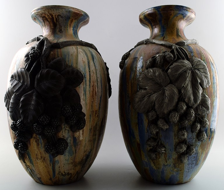 Roger GUERIN (1896-1954) A pair of large French Art Deco ceramic floor vases with blackberry stalks in relief.