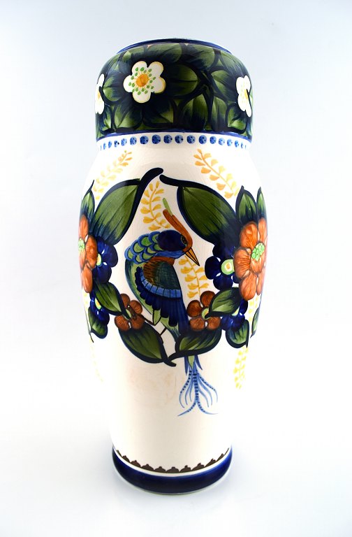 Aluminia/Royal Copenhagen large vase, hand painted with a bird and floral motifs.