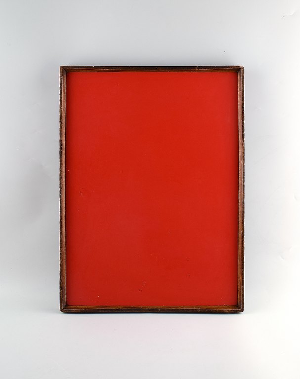 Finn Juhl: Reversible tray of teak with red and black melamine.