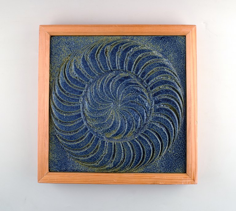 Large and heavy stoneware relief in modern design.