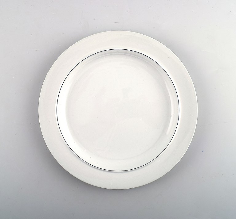 Blue Line, 4 dinner plates from Royal Copenhagen.