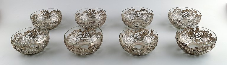 Set of 8 Chinese rinsing bowls of silver with glass inserts,reticulated in the form of flowers and branches.